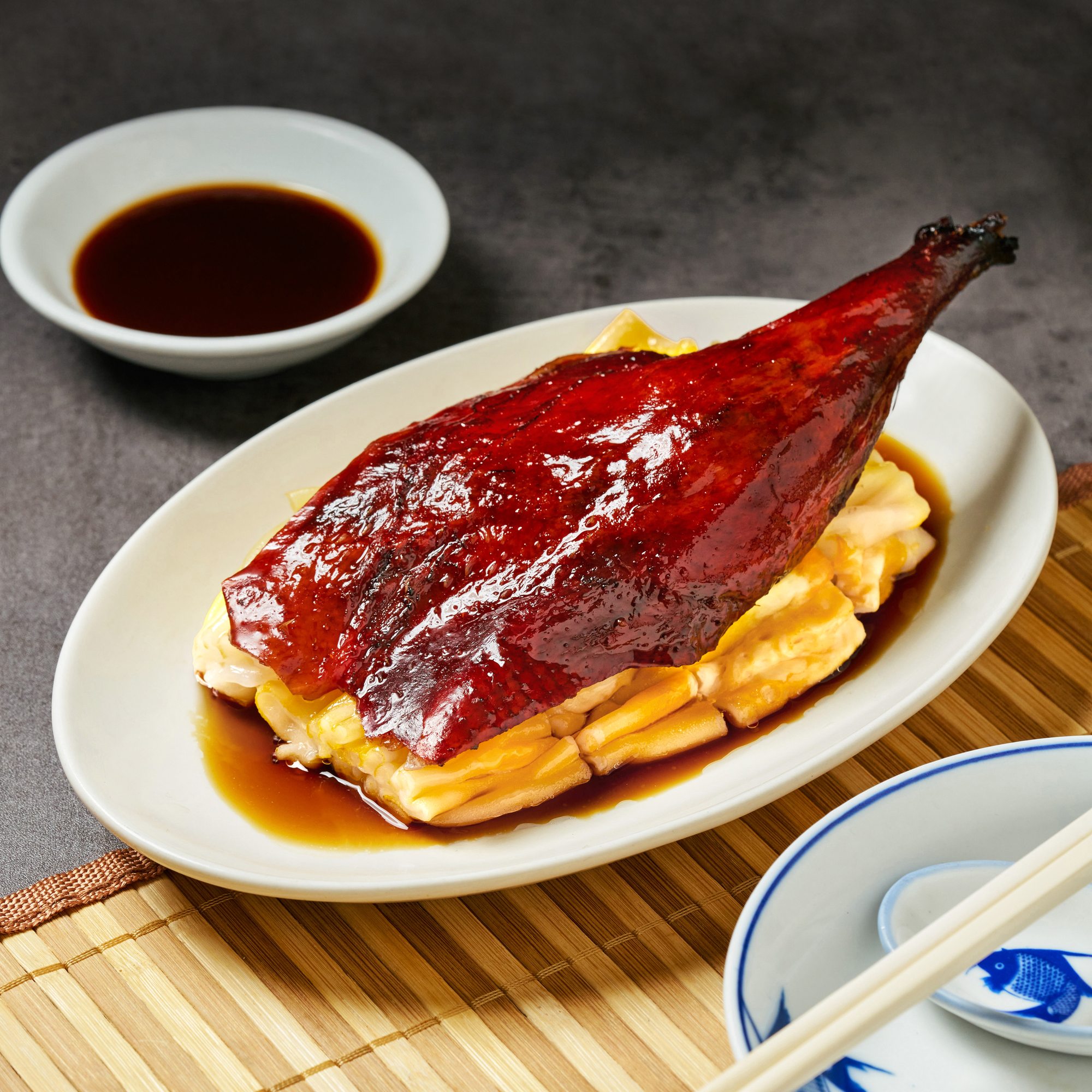 Roasted duck leg on egg tofu