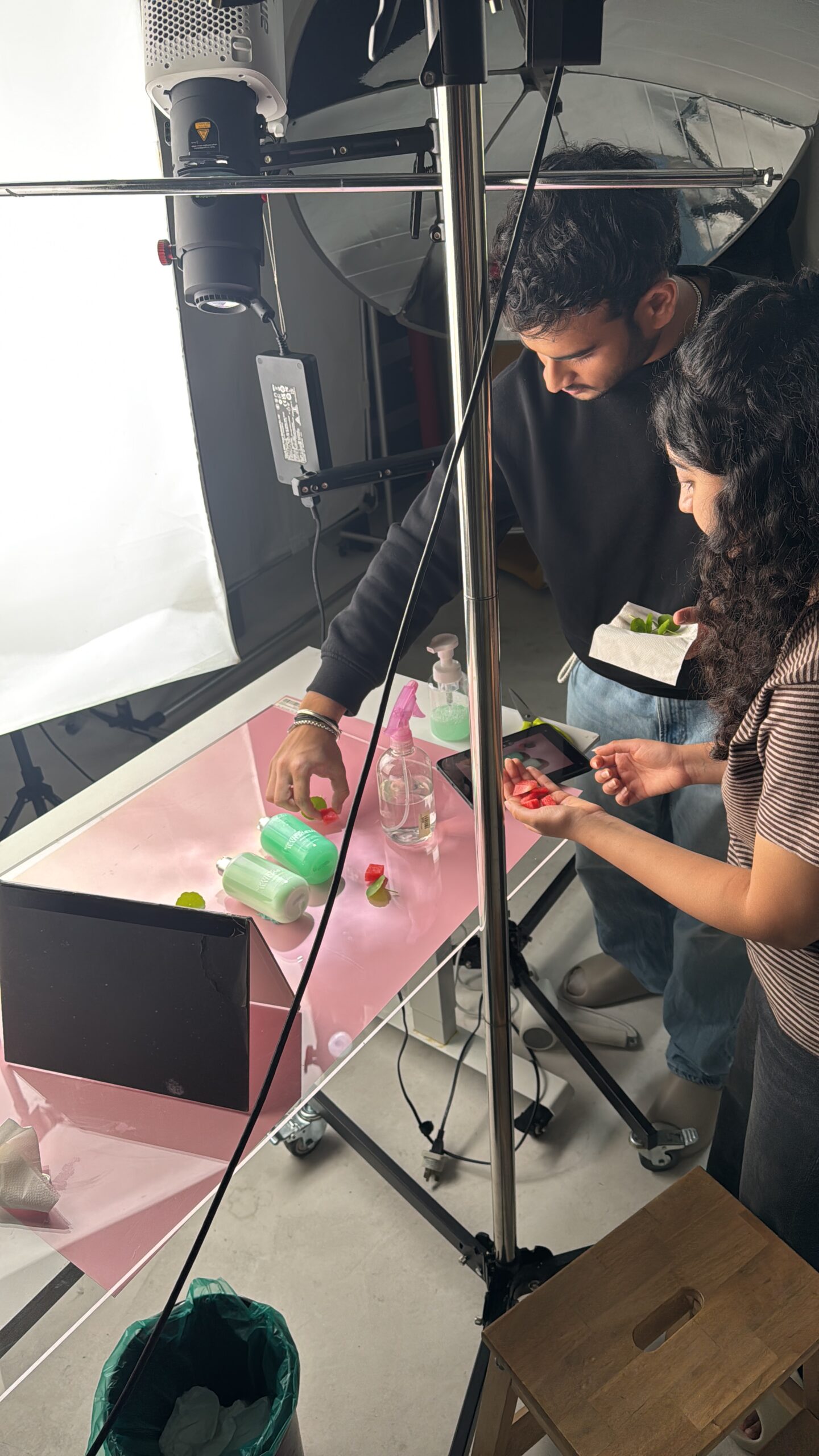 GradePixel team styling watermelon props on the shooting table during the Hairberry shoot
