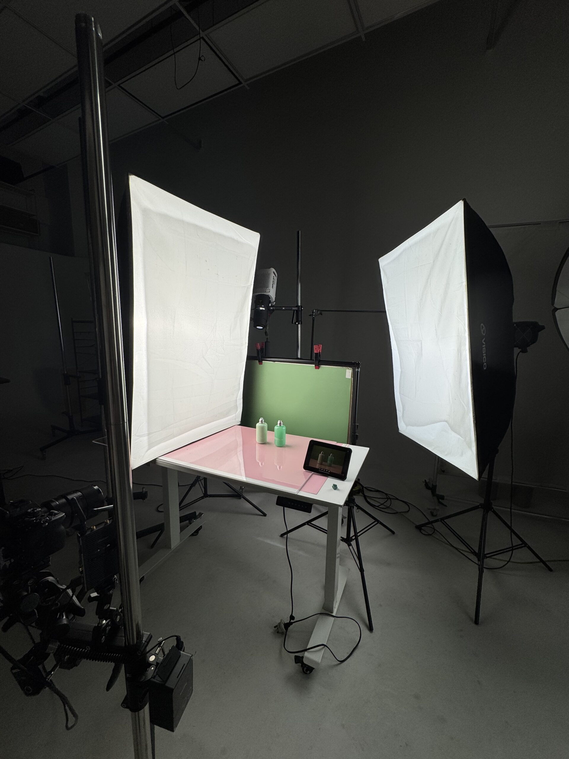GradePixel studio lighting setup for Hairberry shoot — two large softboxes with pink surface and green backdrop