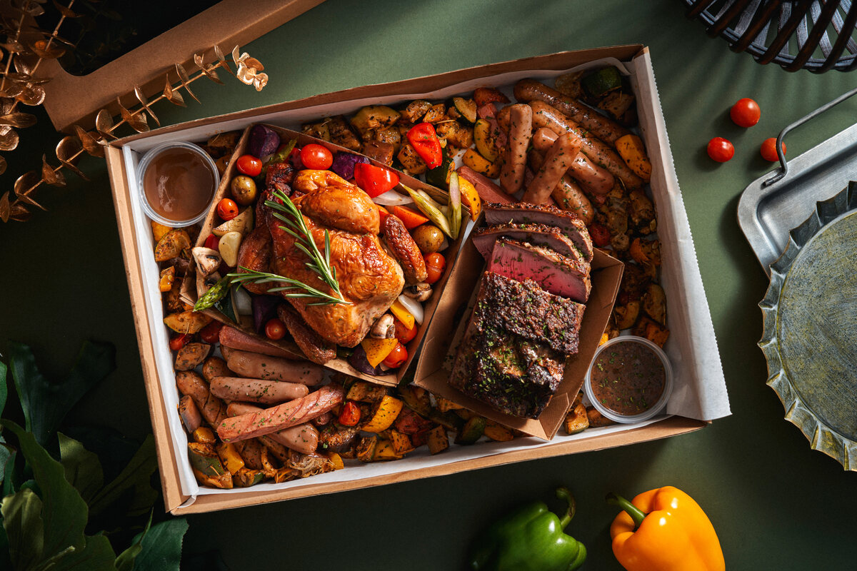 Four Seasons Catering roast chicken and steak festive party box — festive food photography Singapore