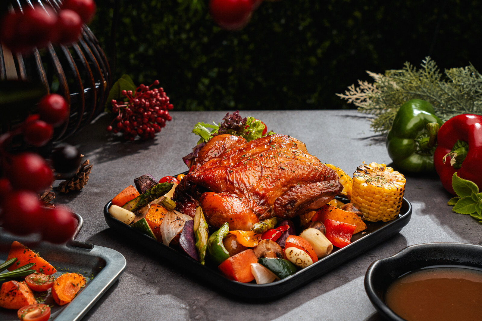 Four Seasons Catering roast pork knuckle on a festive tray — festive food photography Singapore