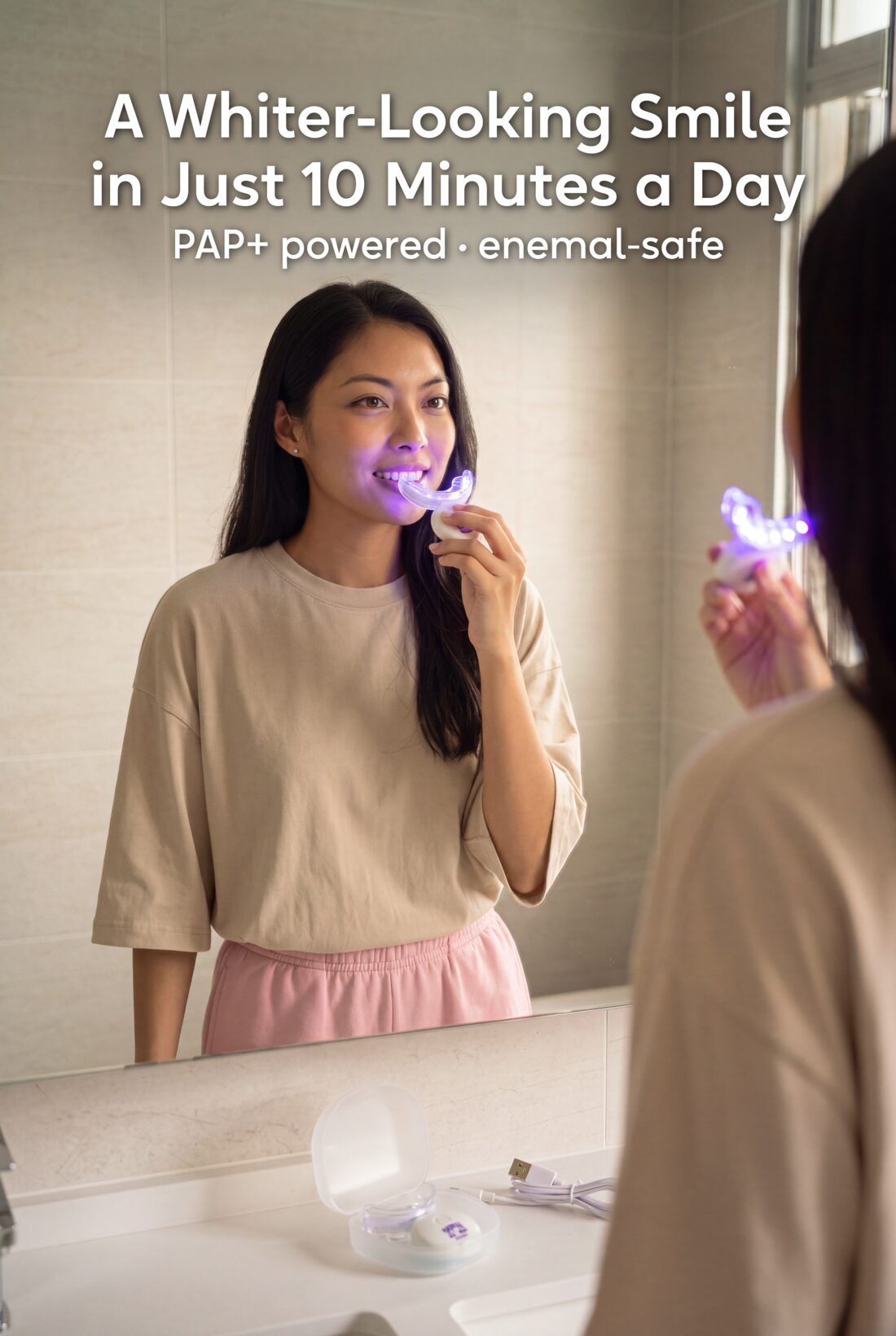 Grin Club LED whitening kit lifestyle image — a woman mid-laugh at an HDB vanity with the purple LED mouthpiece, built with AI product photography