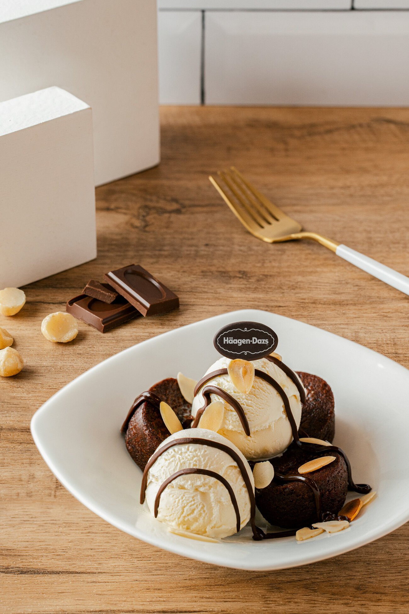 Häagen-Dazs chocolate lava cake with ice cream and almonds — food and beverage photography Singapore