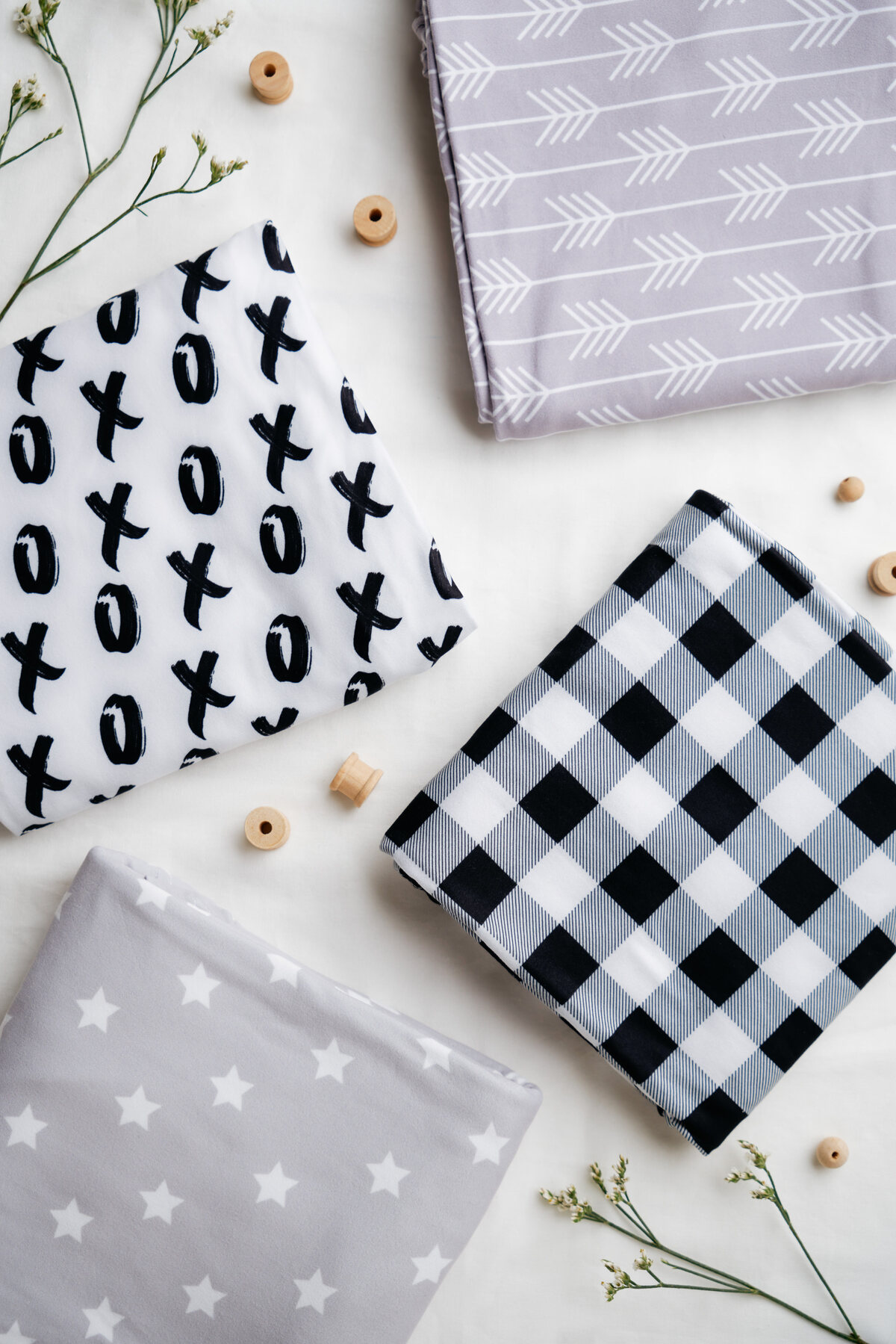 KeaBabies muslin swaddle blankets flat-lay with patterns — product photography