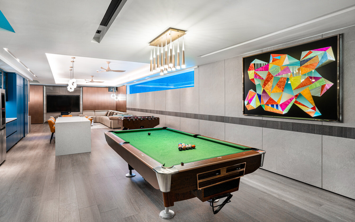 Luxury landed home games room with pool table and feature art — interior photography Singapore