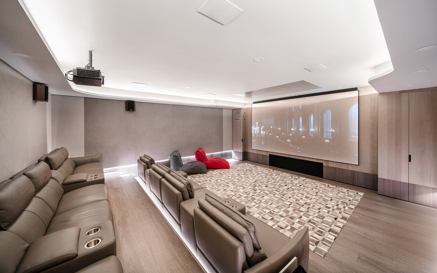 Luxury landed home private home theatre with recliner seating — interior photography Singapore