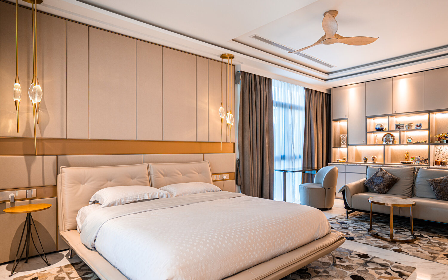 Luxury landed home master bedroom with warm lighting and built-ins — interior photography Singapore