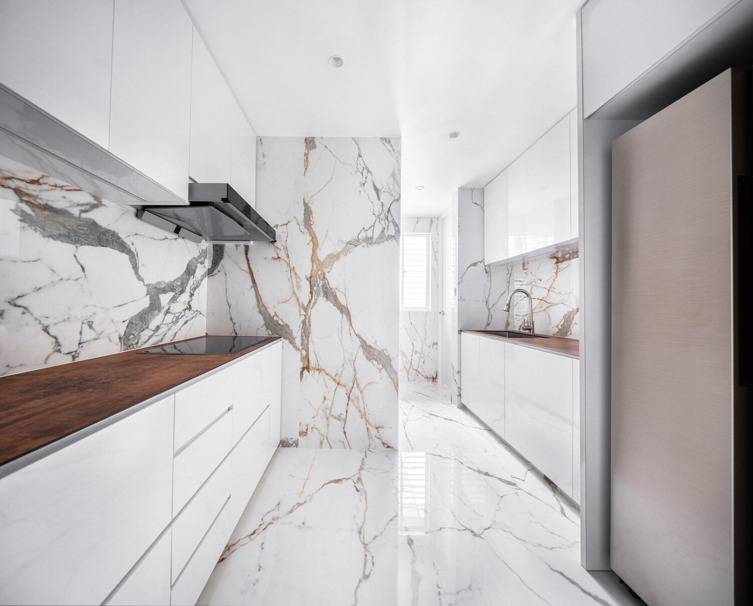 Premium residential Calacatta marble kitchen — interior photography Singapore
