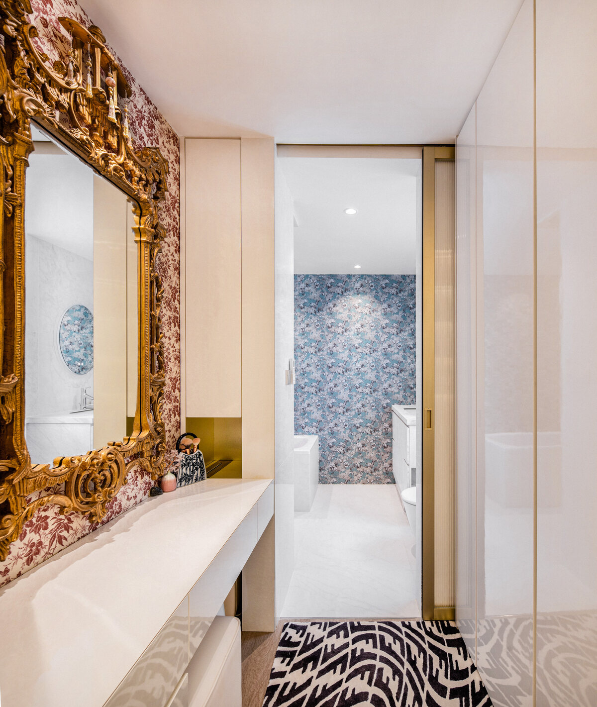 Premium residential powder room with baroque gold mirror — interior photography Singapore