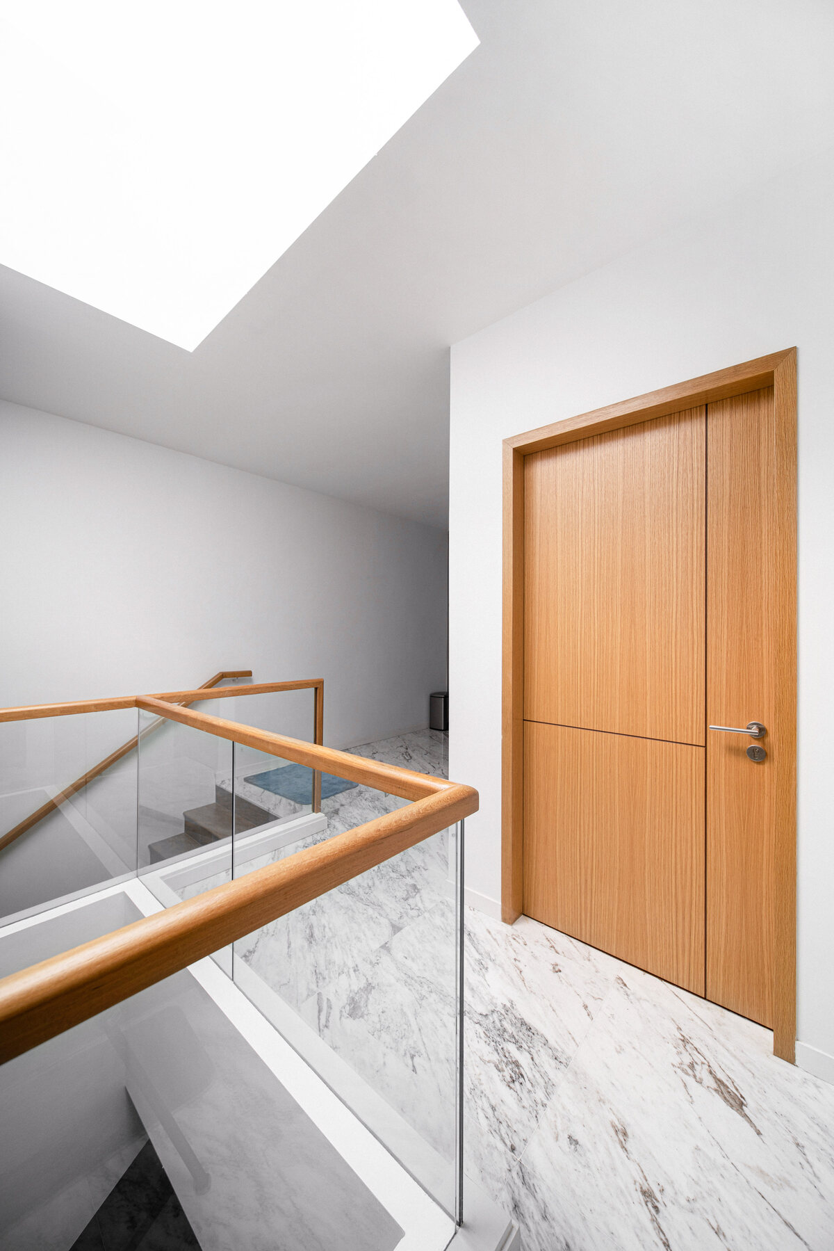 Tai Keng semi-detached home stairwell landing with skylight — architecture photography Singapore