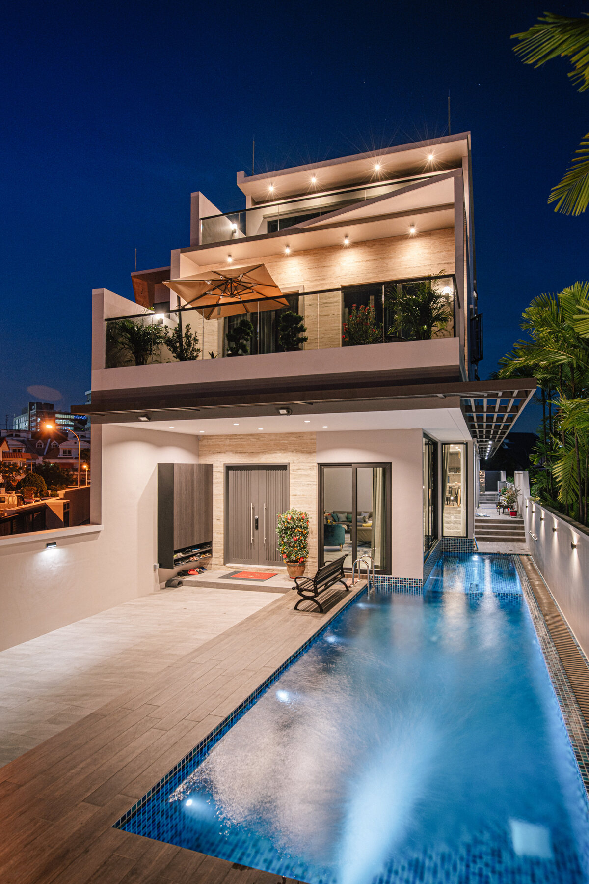 Tai Keng semi-detached home twilight pool and facade — real estate photography Singapore